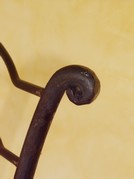 détail montant fer forgé
